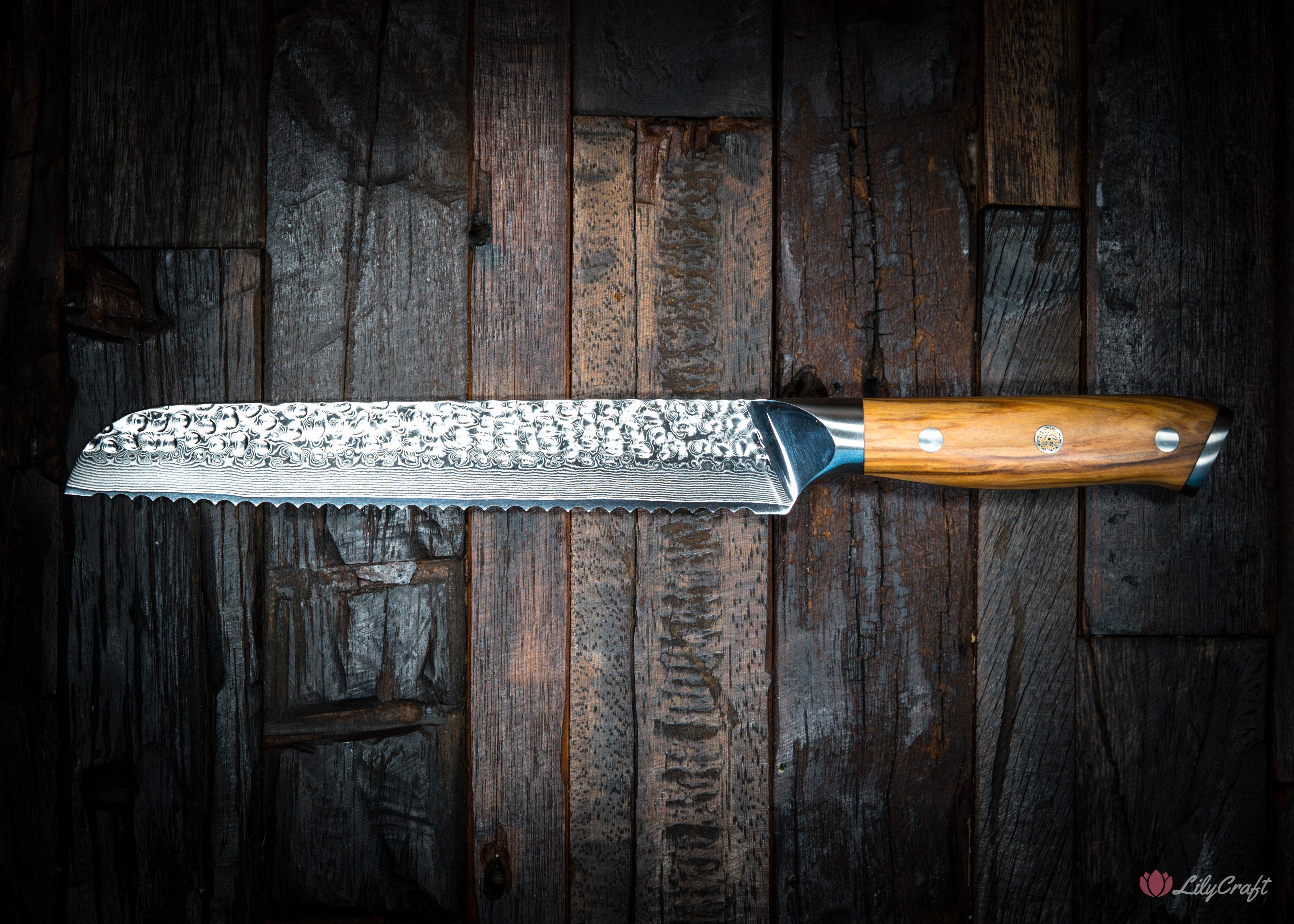Hand-forged Damascus bread knife with hammered finish