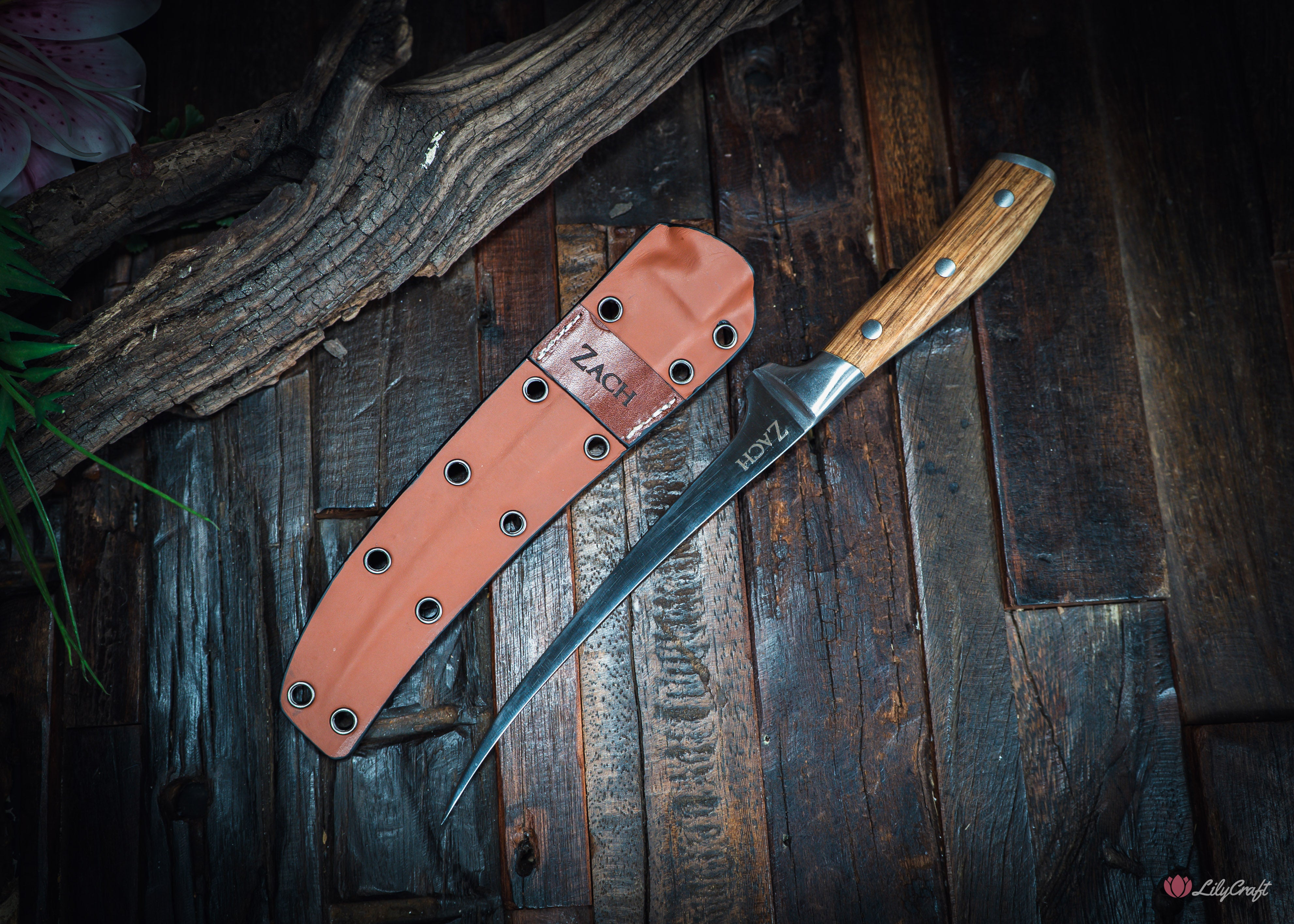 Professional flexible fish fillet knife with contoured zebra wood handle and bolster