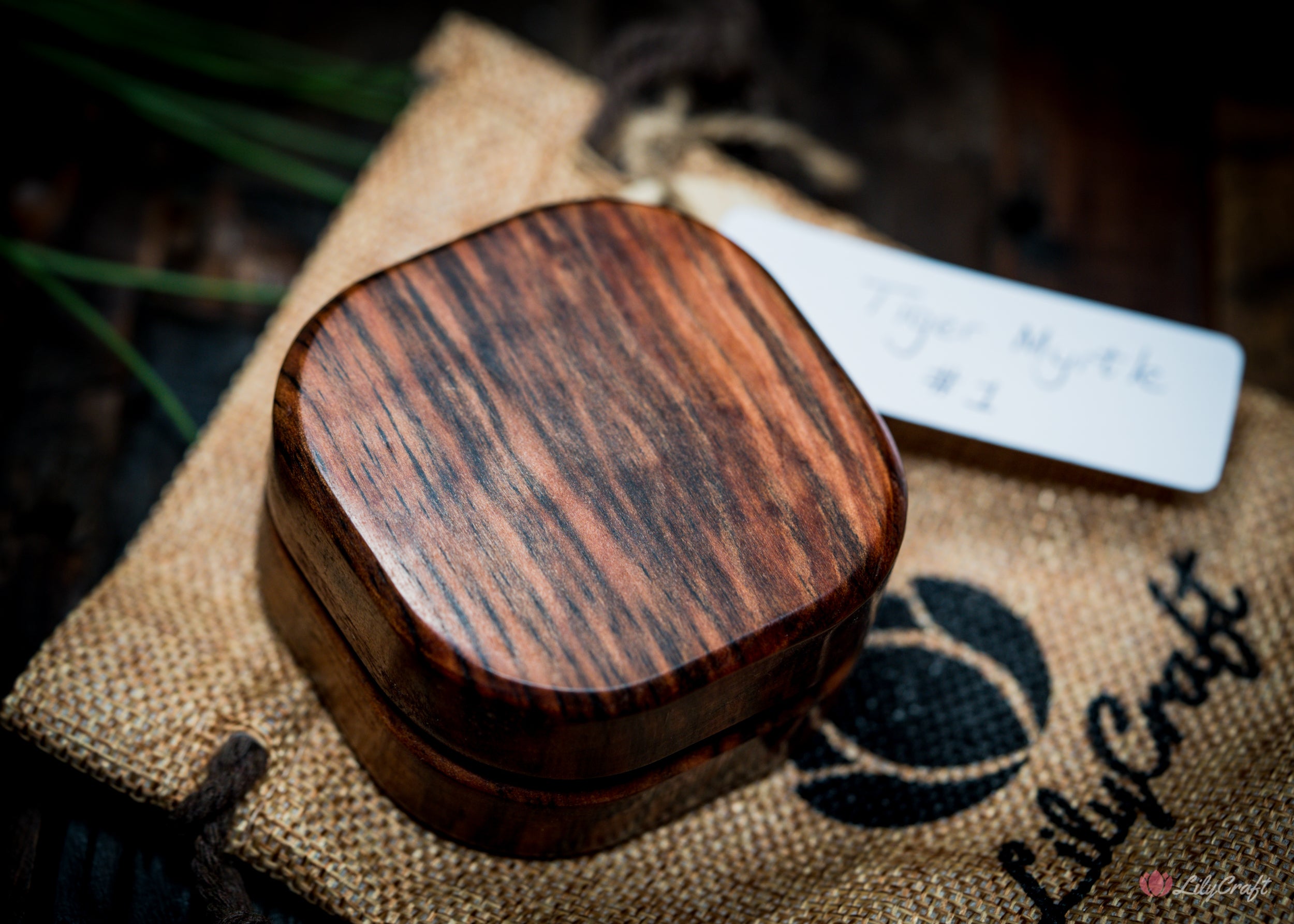 Exotic wood compass in a polished and elegant design.