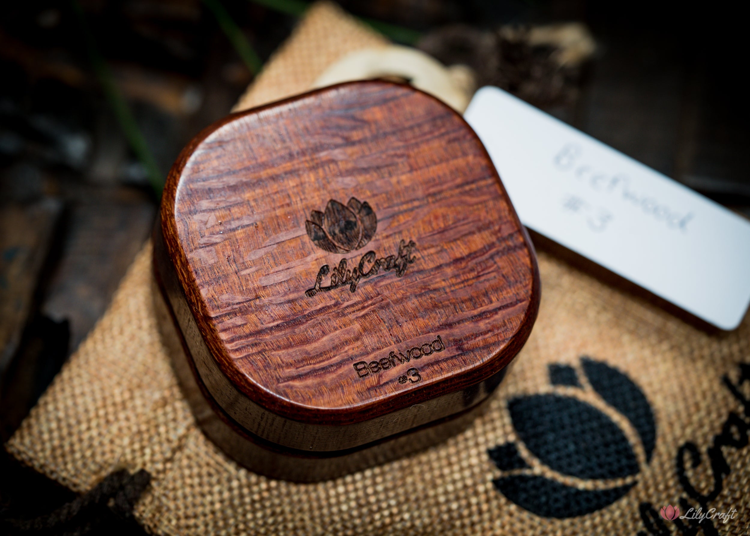 Engraved message on a wooden compass for a sentimental touch.
