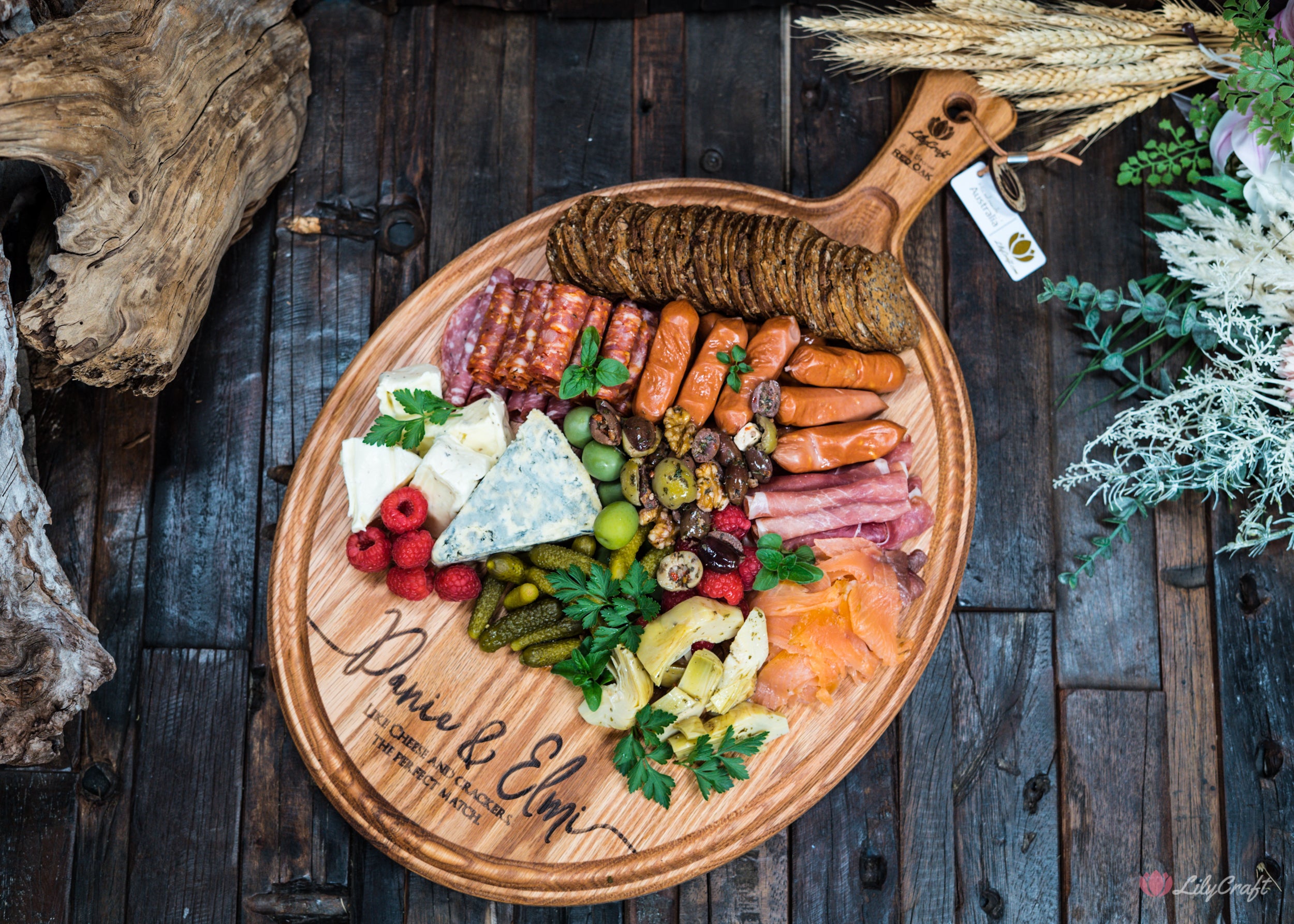 Elegant wooden charcuterie display, meticulously handcrafted for special occasions. This versatile board is designed to meet your hosting needs with style.
