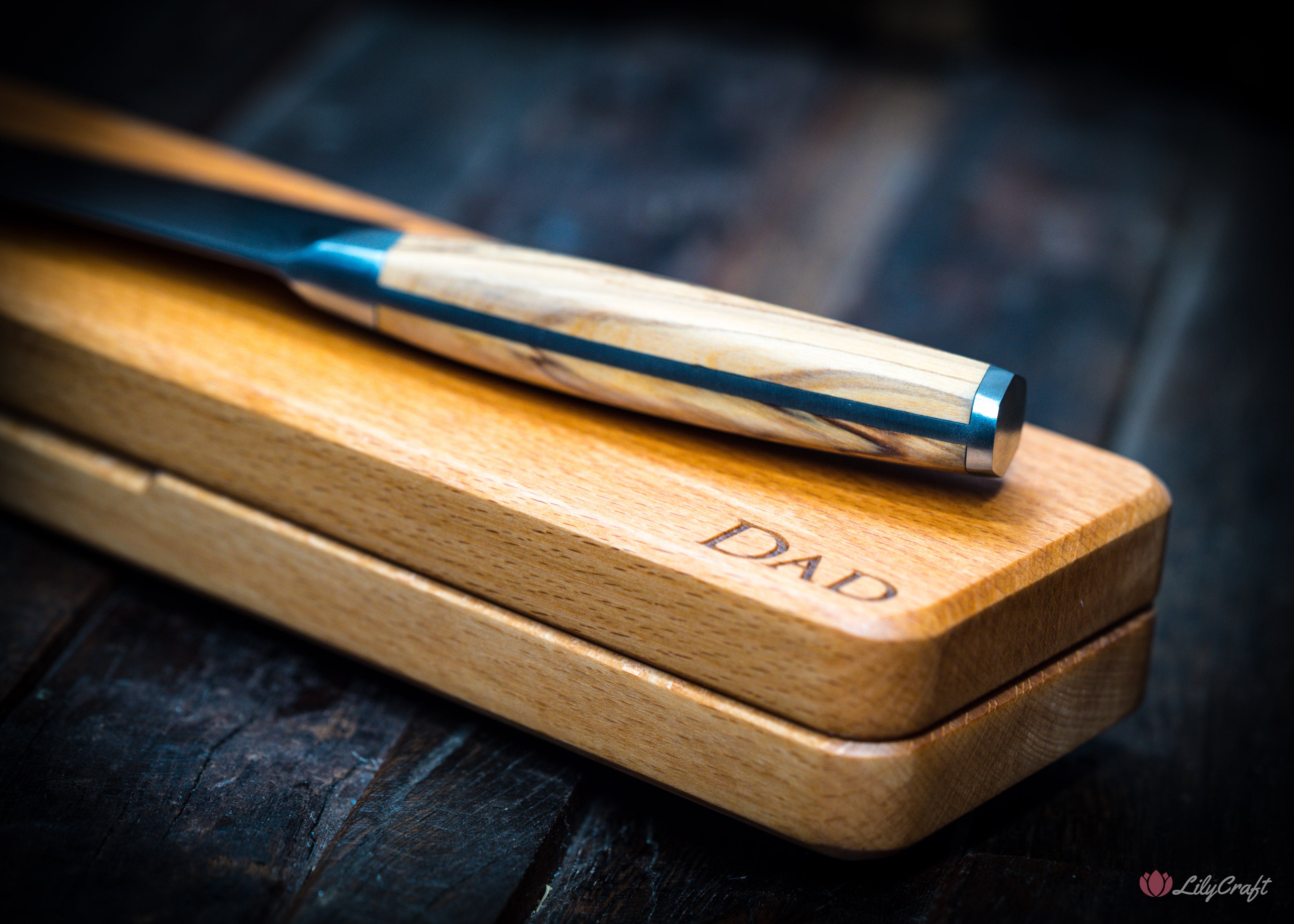 Damascus-style chef knife with custom wood handle