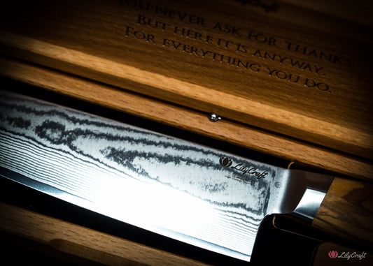 Damascus steel Santoku knife with ergonomic olive wood grip