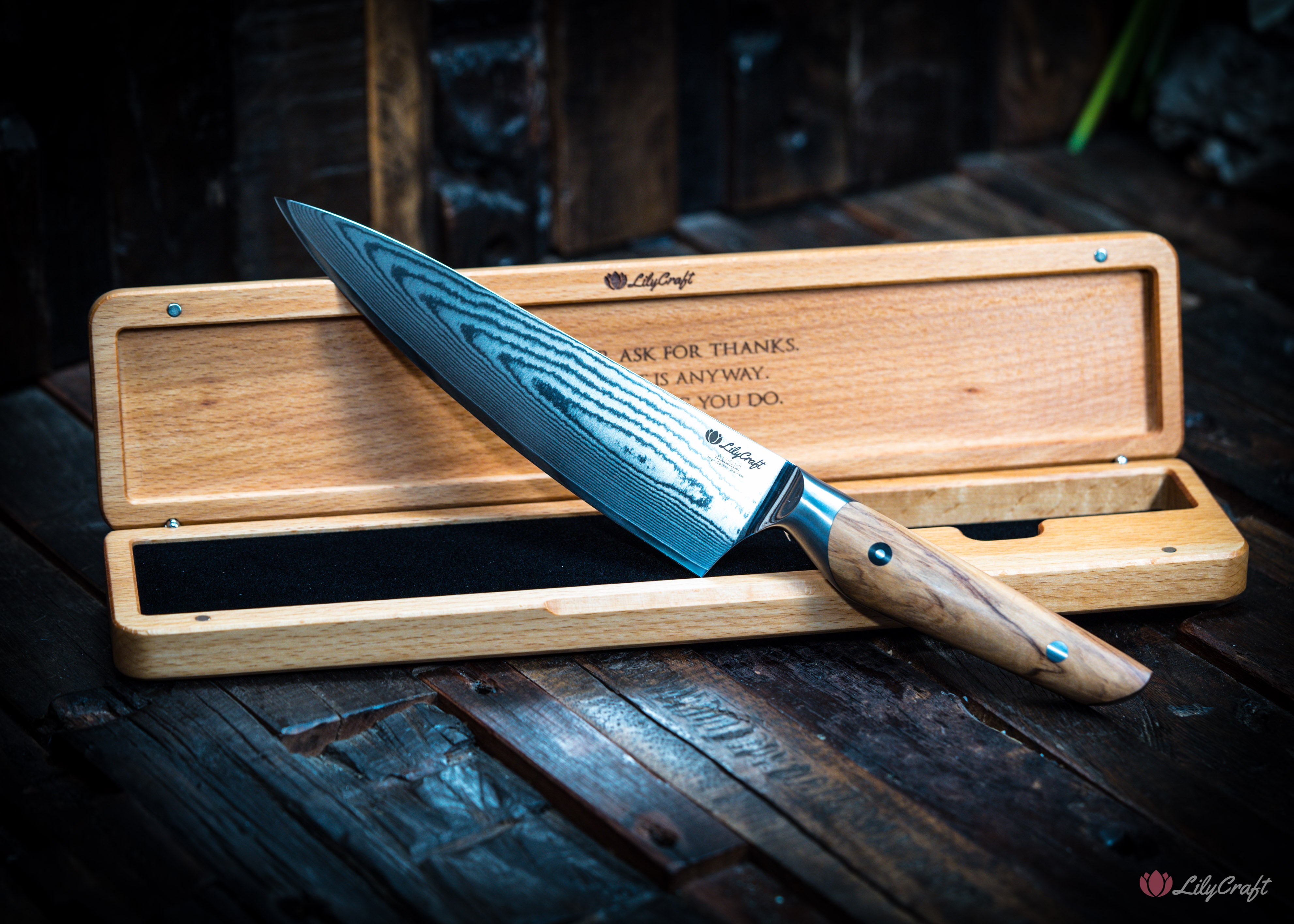 Custom engraved chef’s knife with olive wood grip