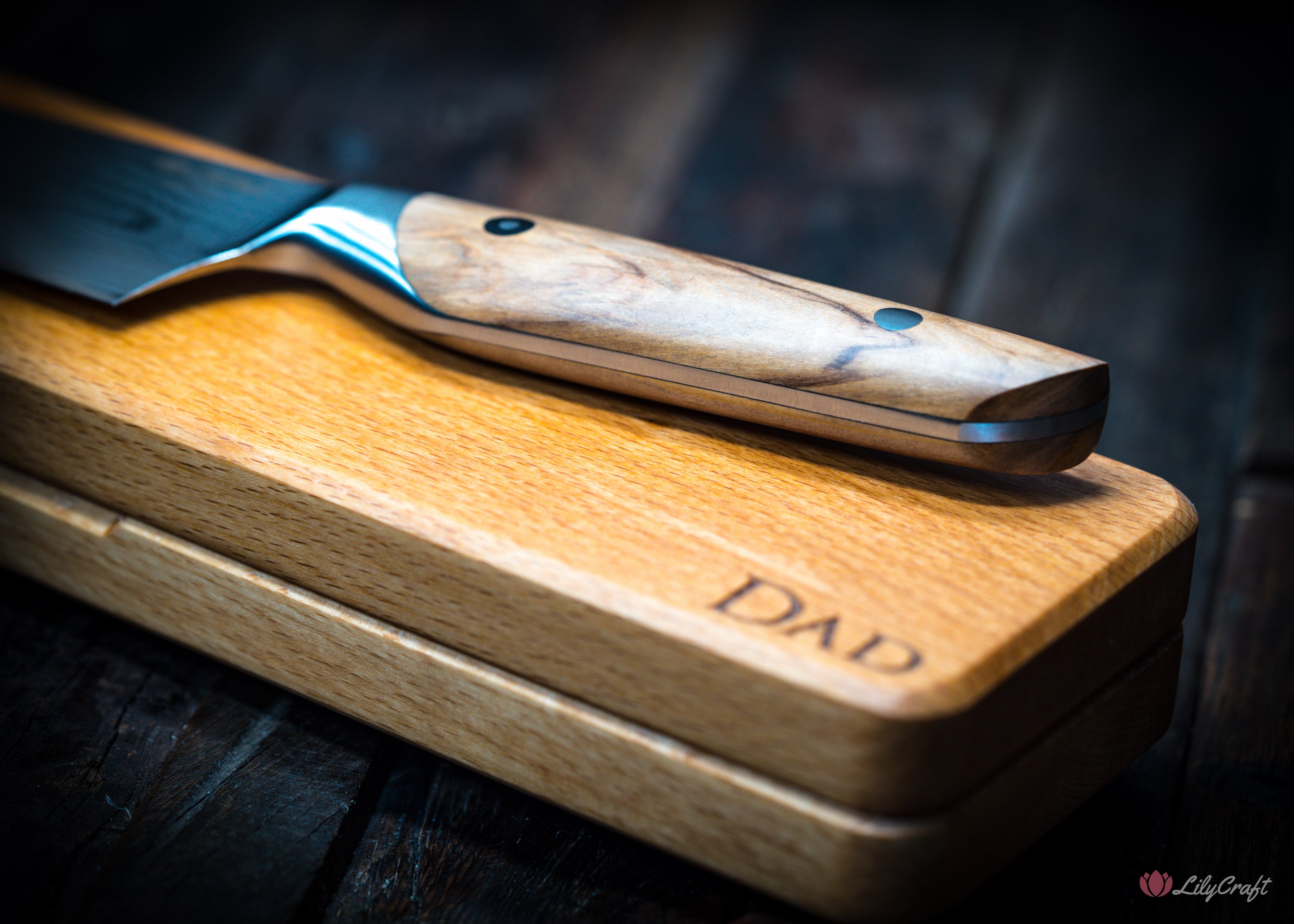 Damascus steel cooking knife with ergonomic wood handle