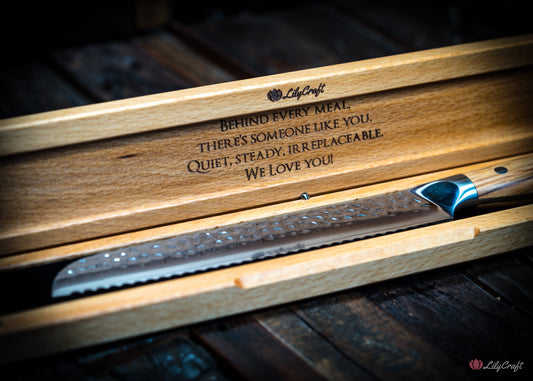 Hand-forged Damascus bread knife with olive wood grip