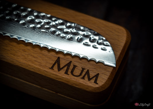 Hammered Damascus bread slicer with ergonomic wood grip