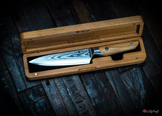 Handcrafted Damascus steel kitchen knife with olive wood grip