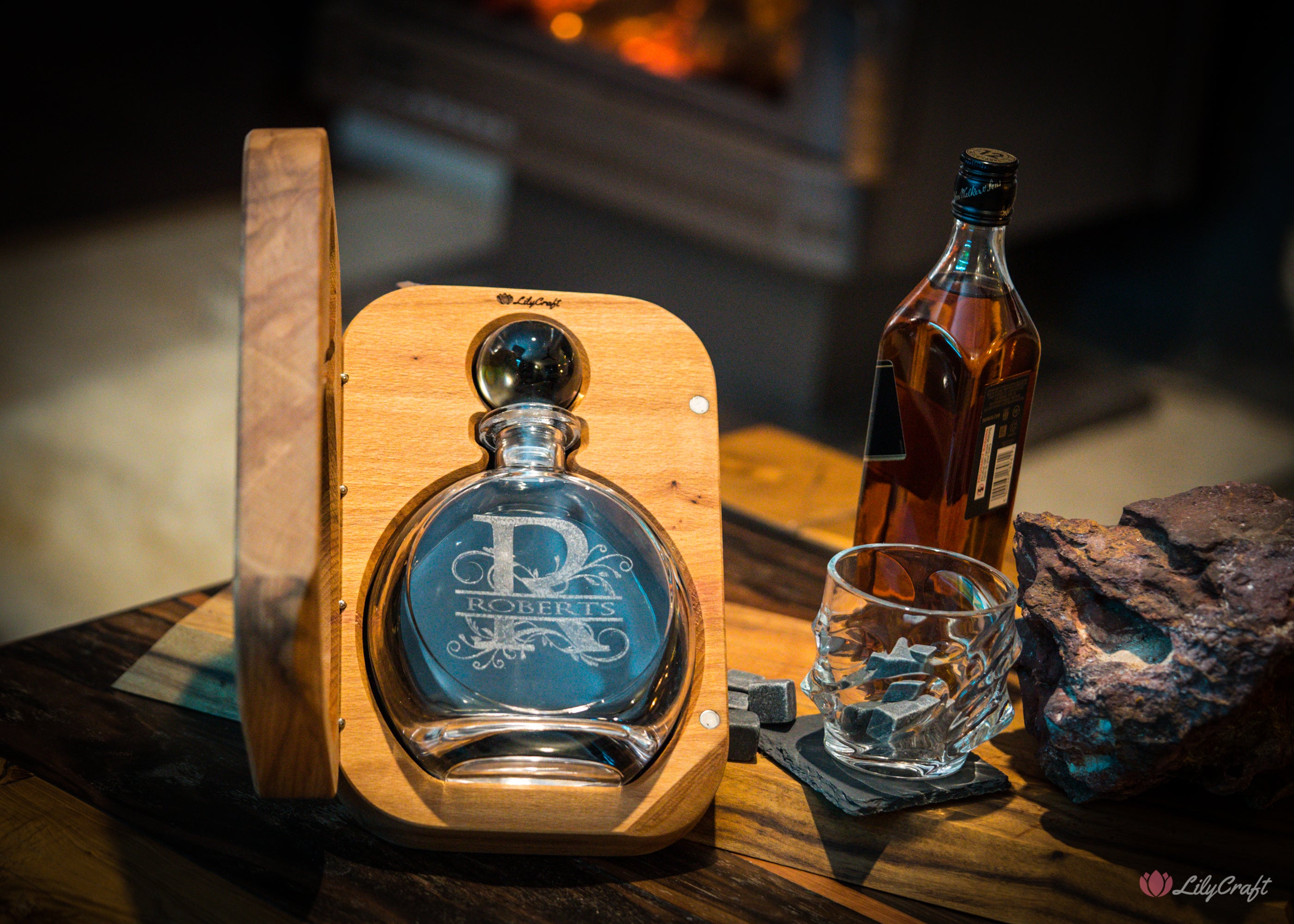 Elegant whiskey dispenser with custom wooden packaging.