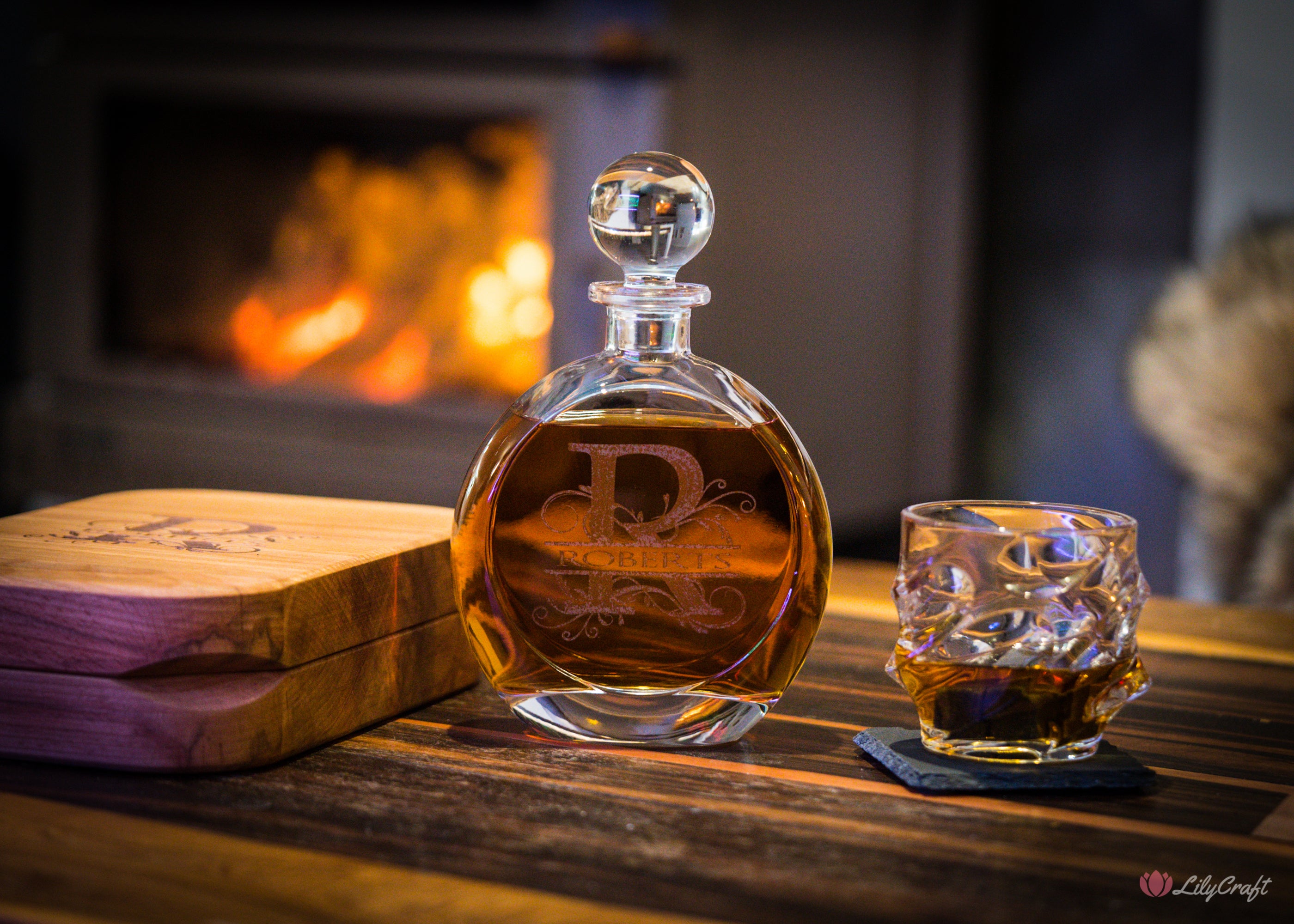 Custom liquor decanter with engraved details and luxury wooden case.