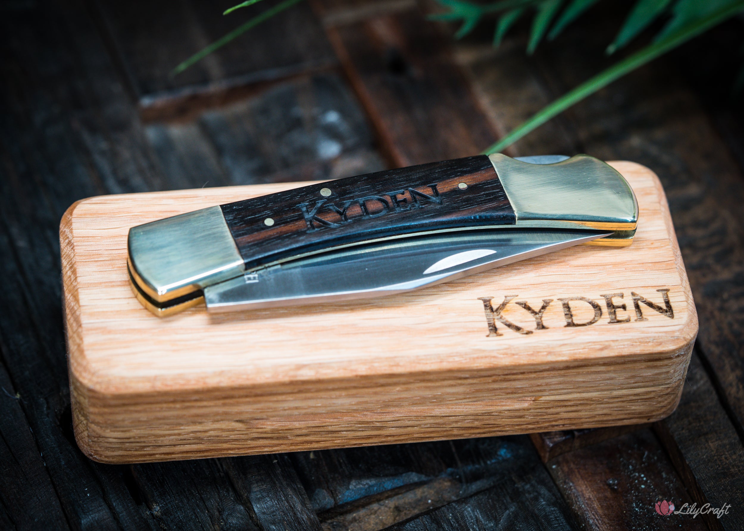 Premium folding knife with fine Ebony Wood detailing and timeless aesthetics