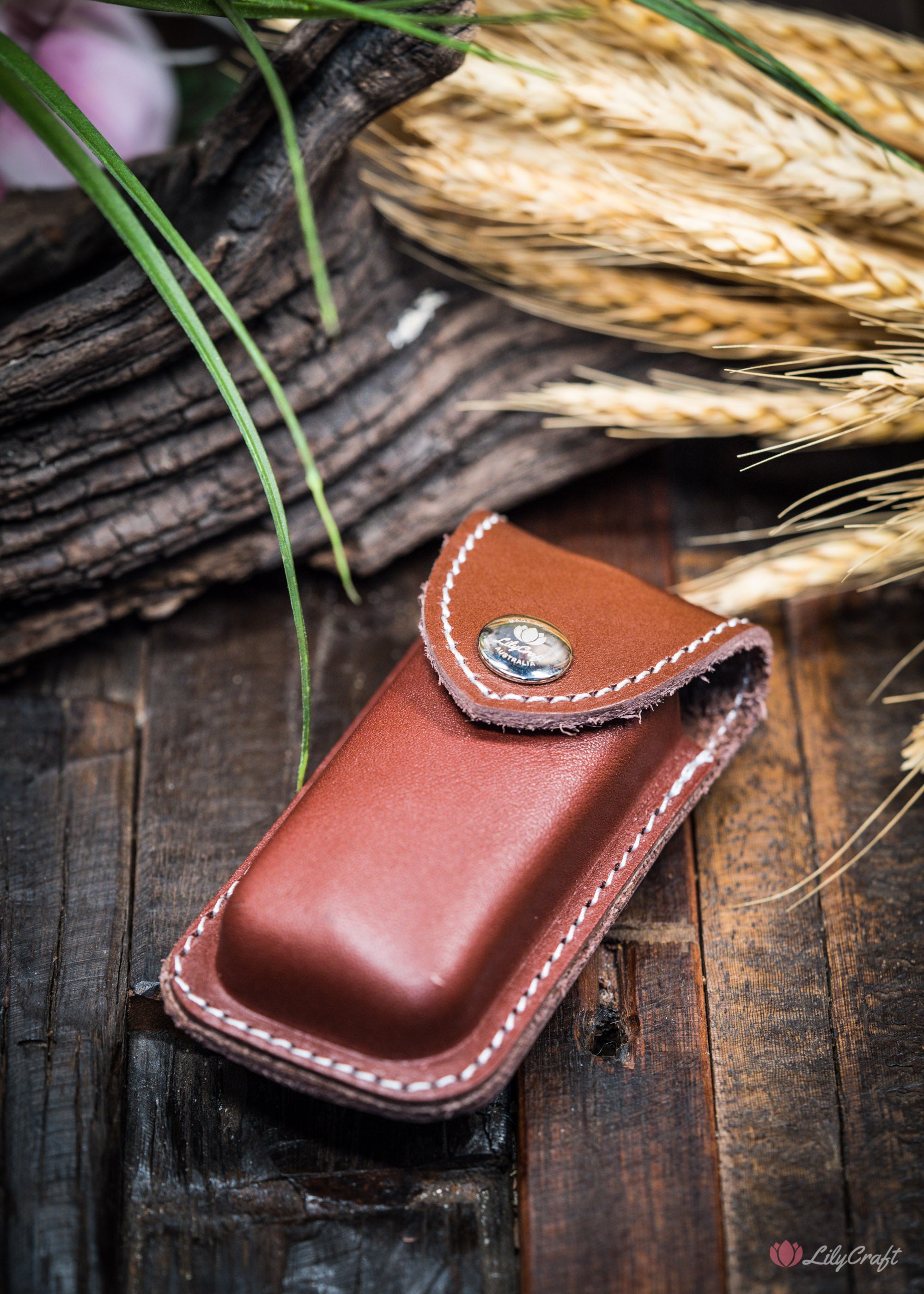 Knife holster for belt made from natural leather