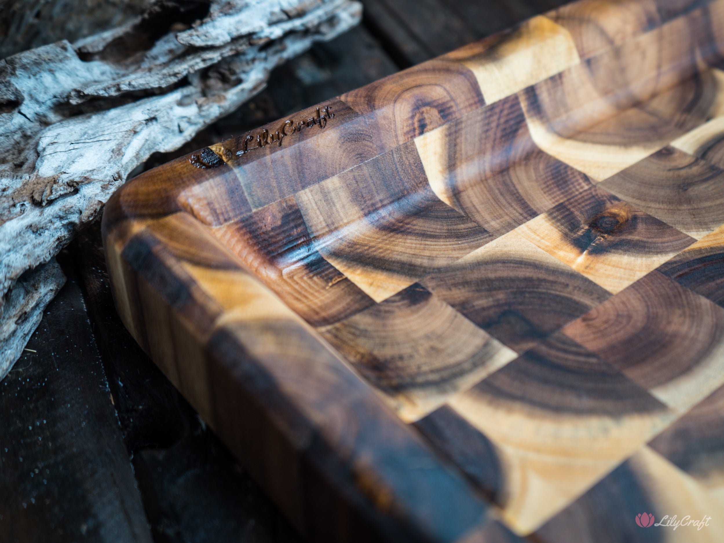 A large endgrain butcher's block BBQ cutting board with a perfect size for outdoor grilling.