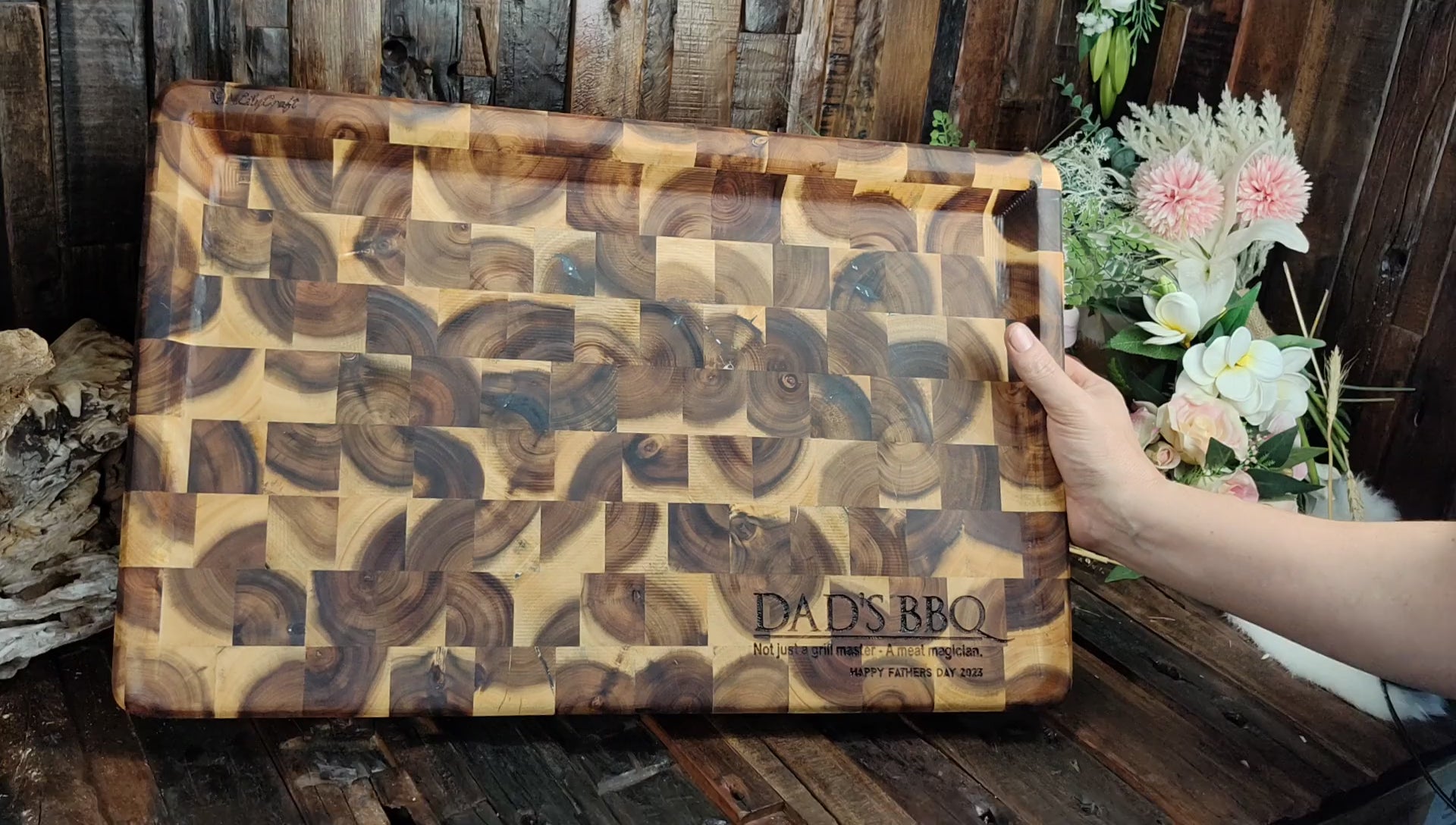 A stunning endgrain butcher's block BBQ cutting board with a sleek design.