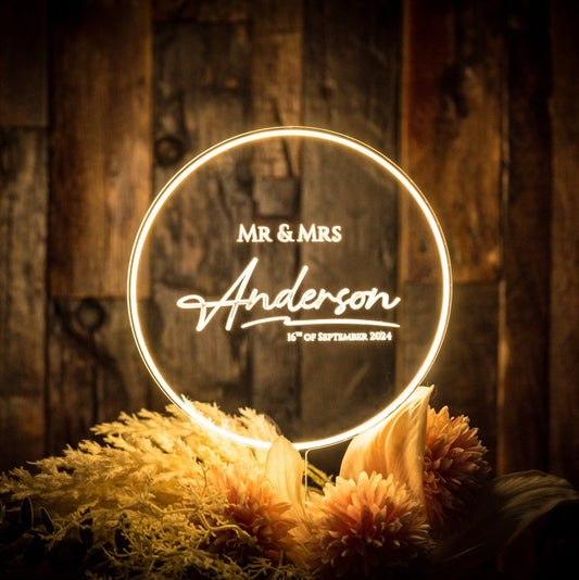 LED Cake Topper casting a romantic glow on elegant cake decor.