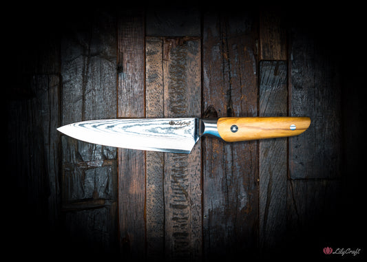 Japanese Damascus utility knife with olive wood handle