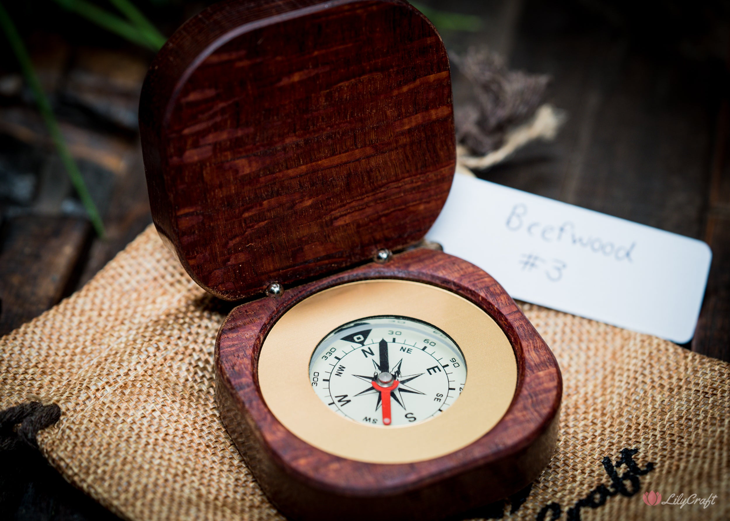 Detailed shot of the brass dial on a handmade compass.