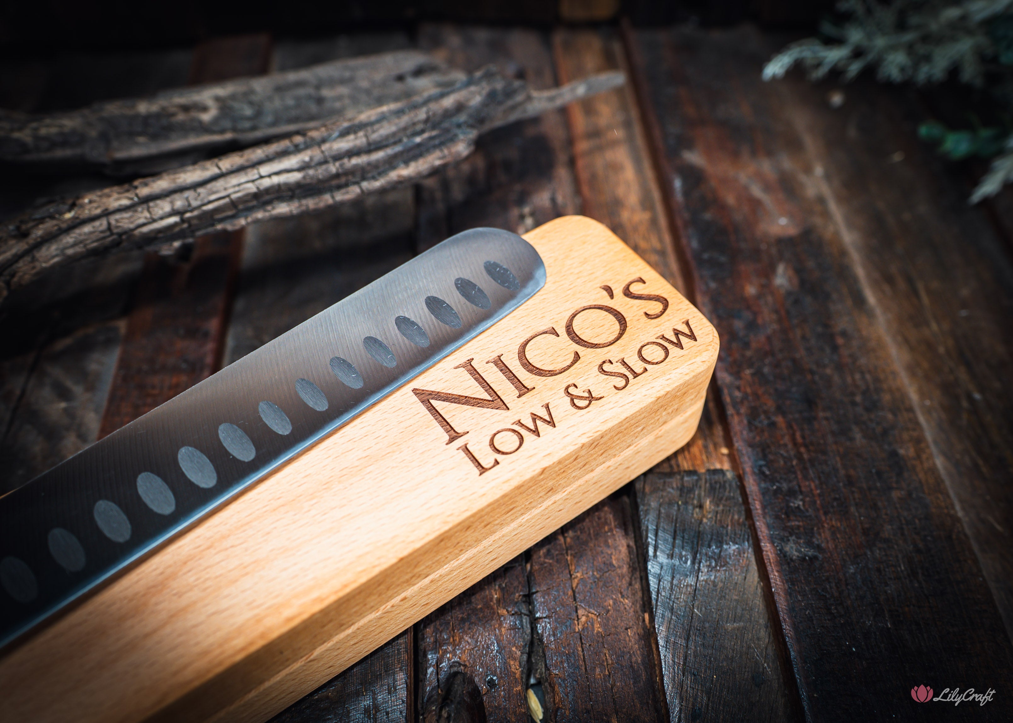 Smoked brisket knife with hollow scallops stopping meat from sticking to blade