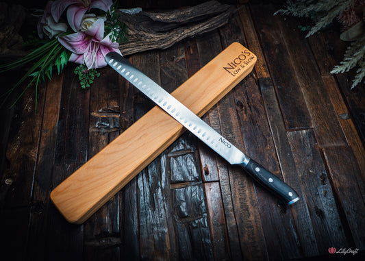Personalised BBQ slicing knife resting in custom engraved wooden gift box