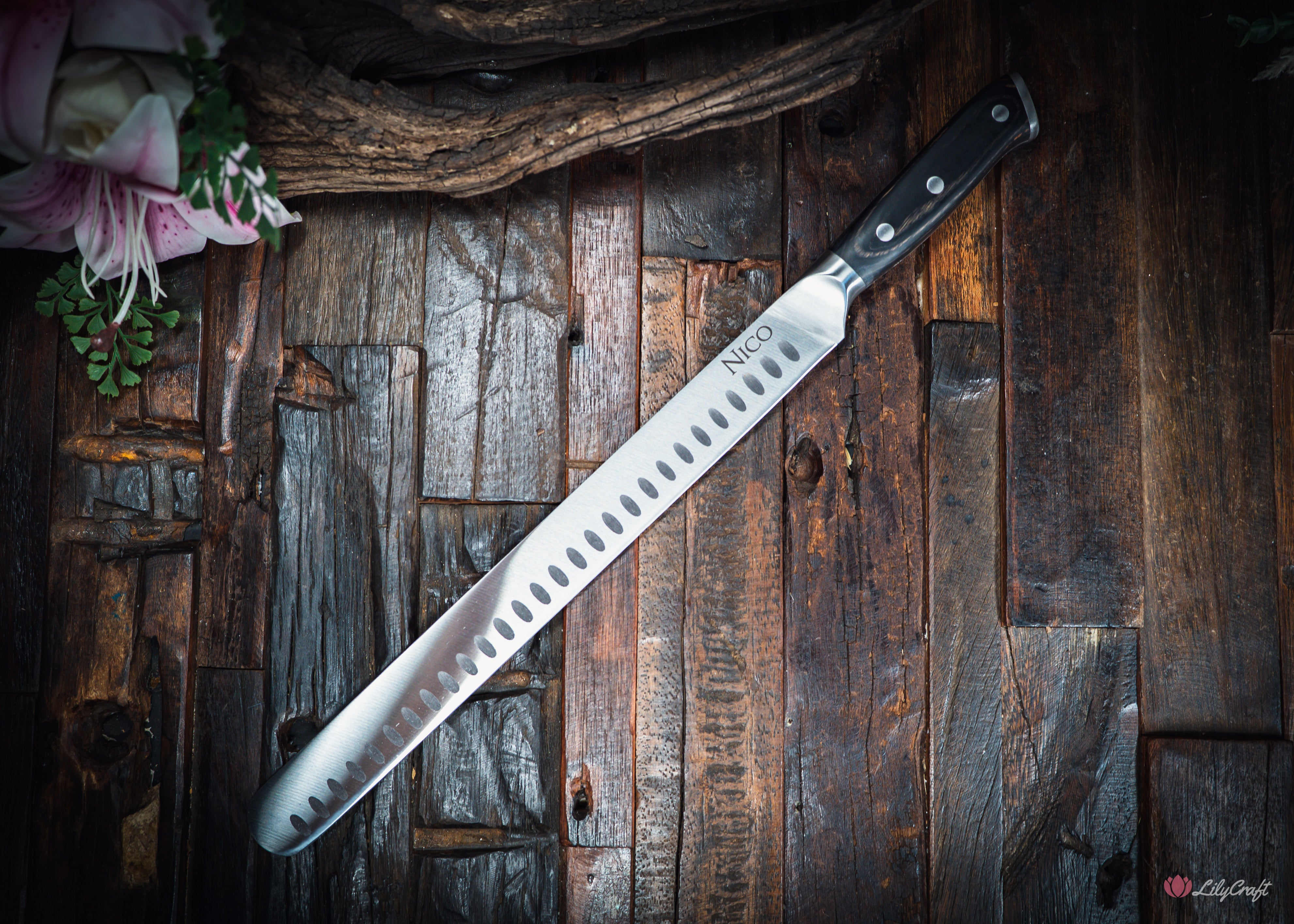 Smoked meat slicing knife with non stick scallops for clean brisket cuts