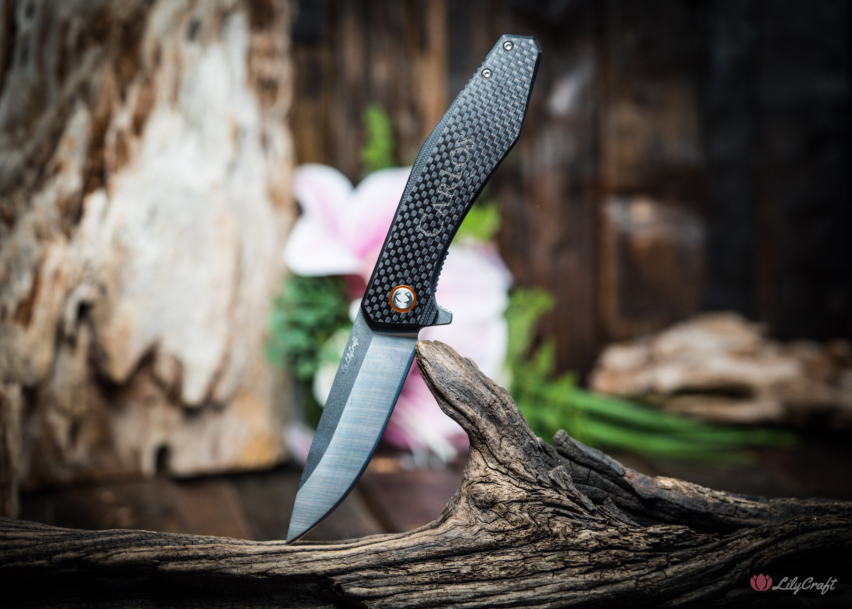 Personalized pocket knife with carbon fiber handle