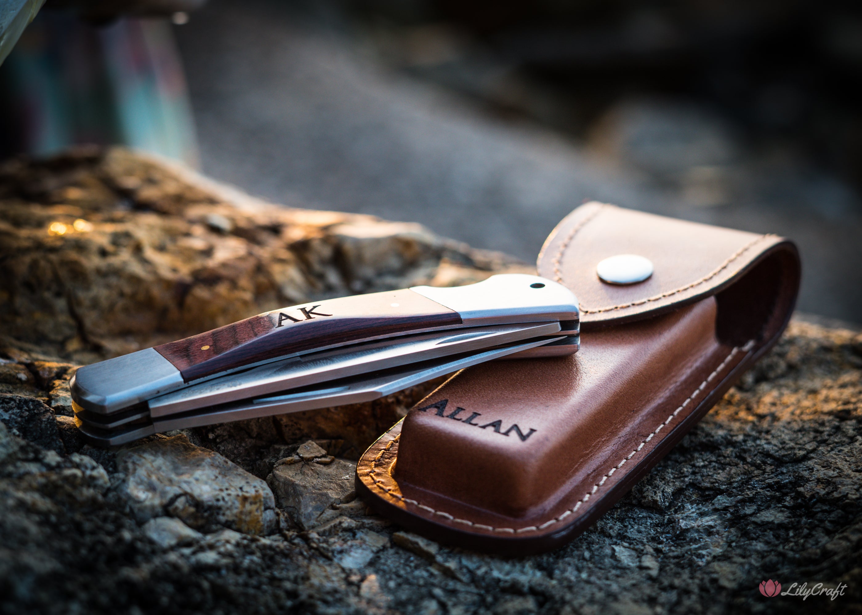 fishing pocket knife with leather pouch