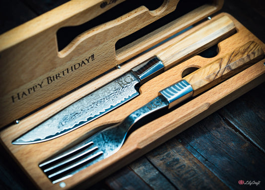 Premium Damascus steak knife and fork set with olive wood handles