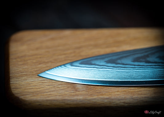 Utility knife made from Japanese Damascus steel