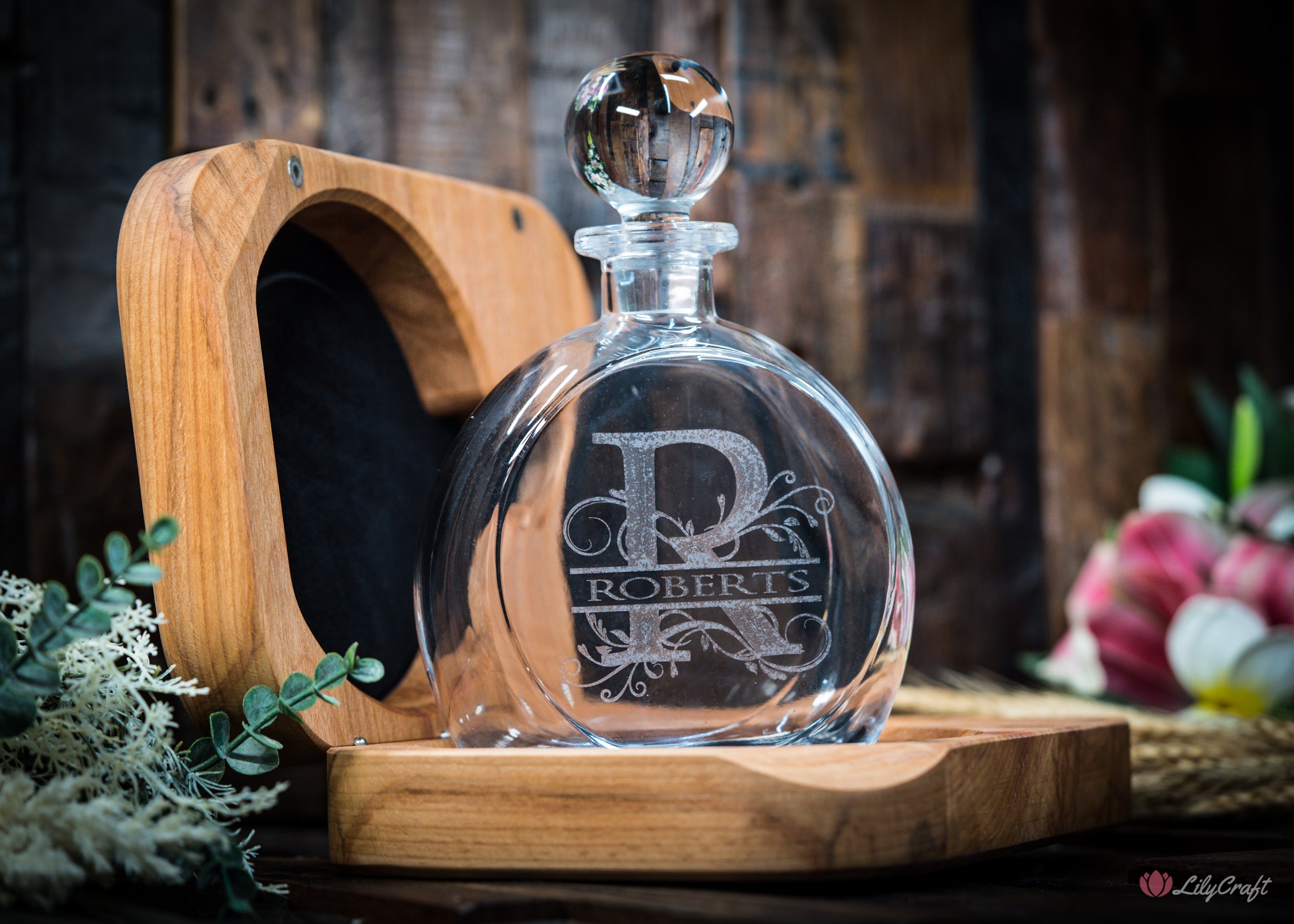 Luxury glass whiskey decanter with custom wooden box.