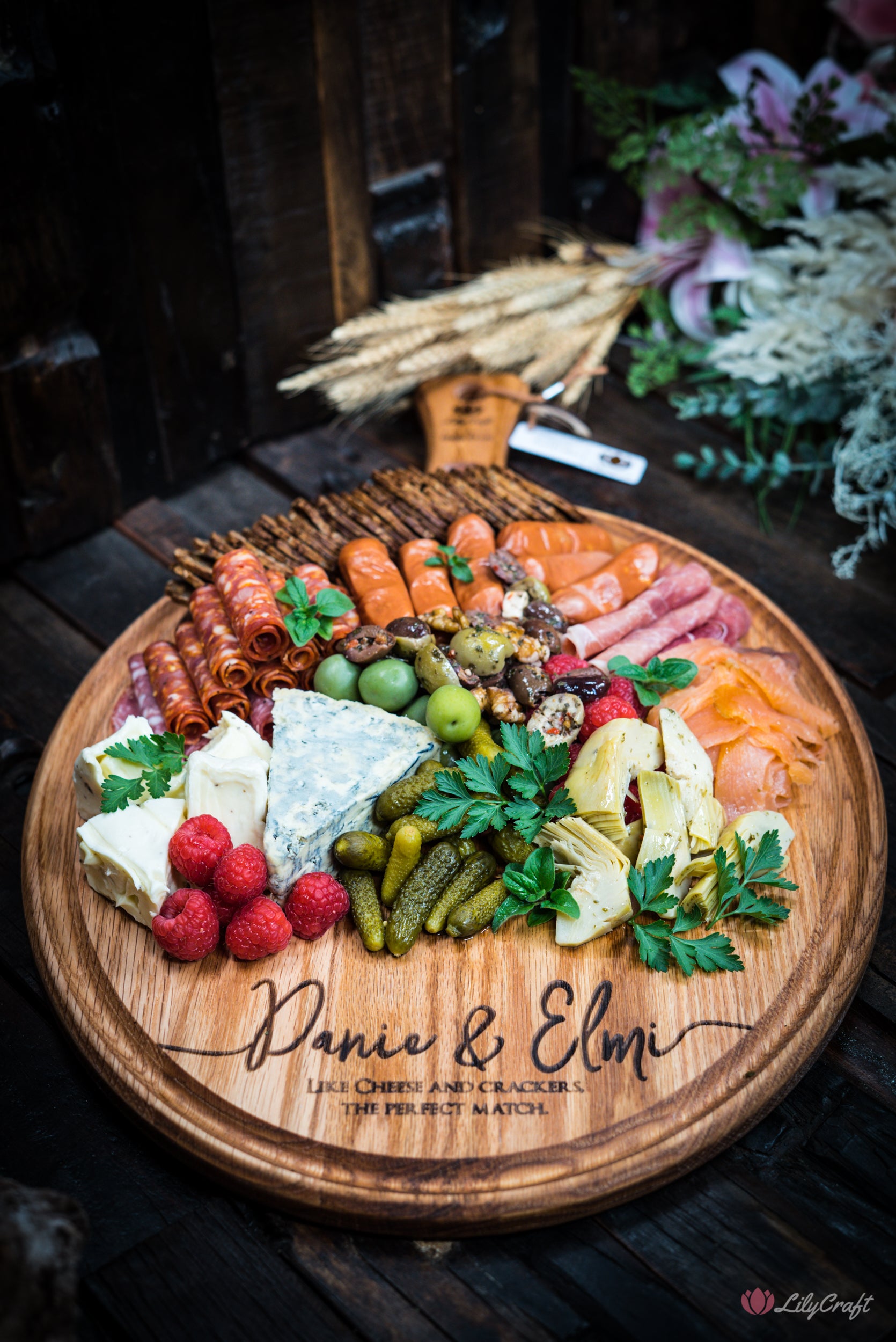 Experience the rich craftsmanship of our Red Oak Cheeseboard, meticulously designed for an elegant charcuterie presentation. This wooden cutting board is the perfect addition to your hosting collection.