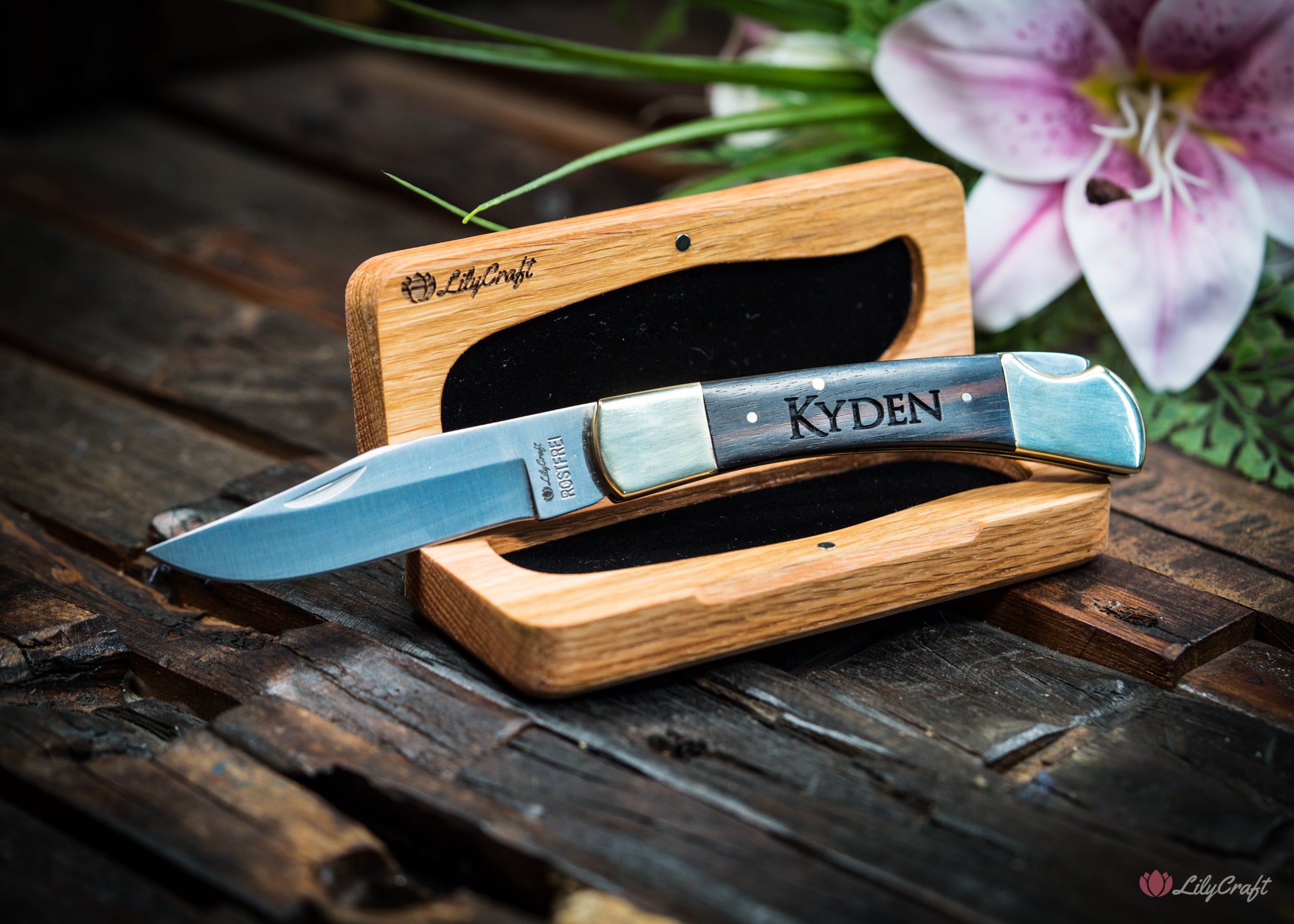 Pocket Knife with precision-engraved blade and exquisite Macassar Ebony handle