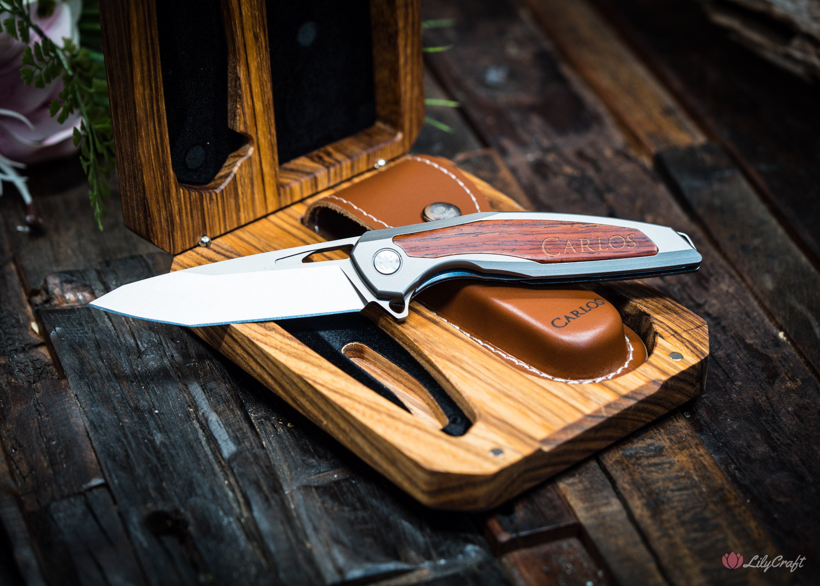 high end flip knife with rose wood inlay