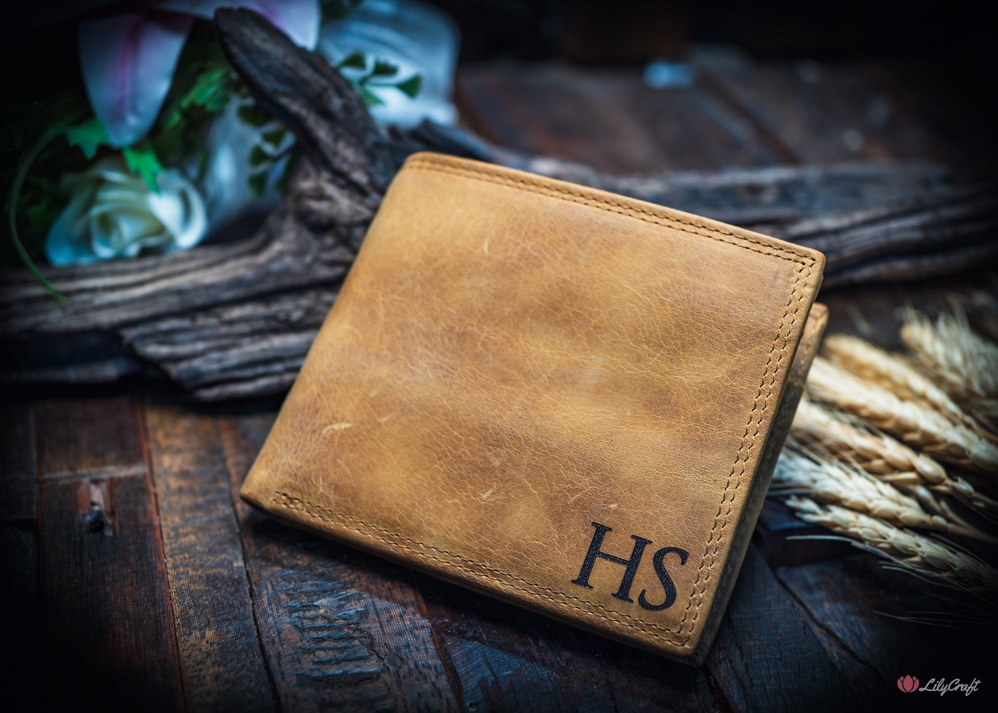 Close up of cowhide wallet engraving on the inside coin pocket flap.