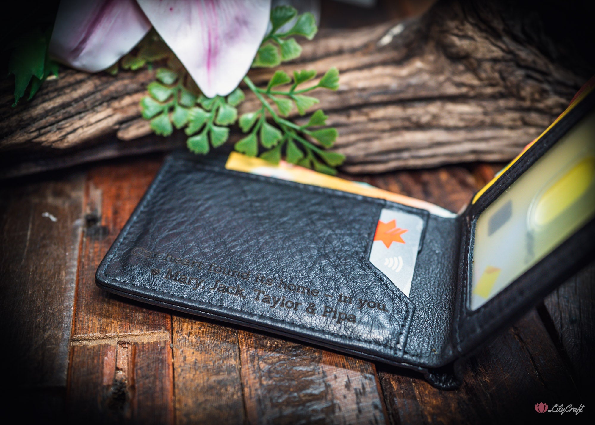 small black men’s leather wallet with cash pocket