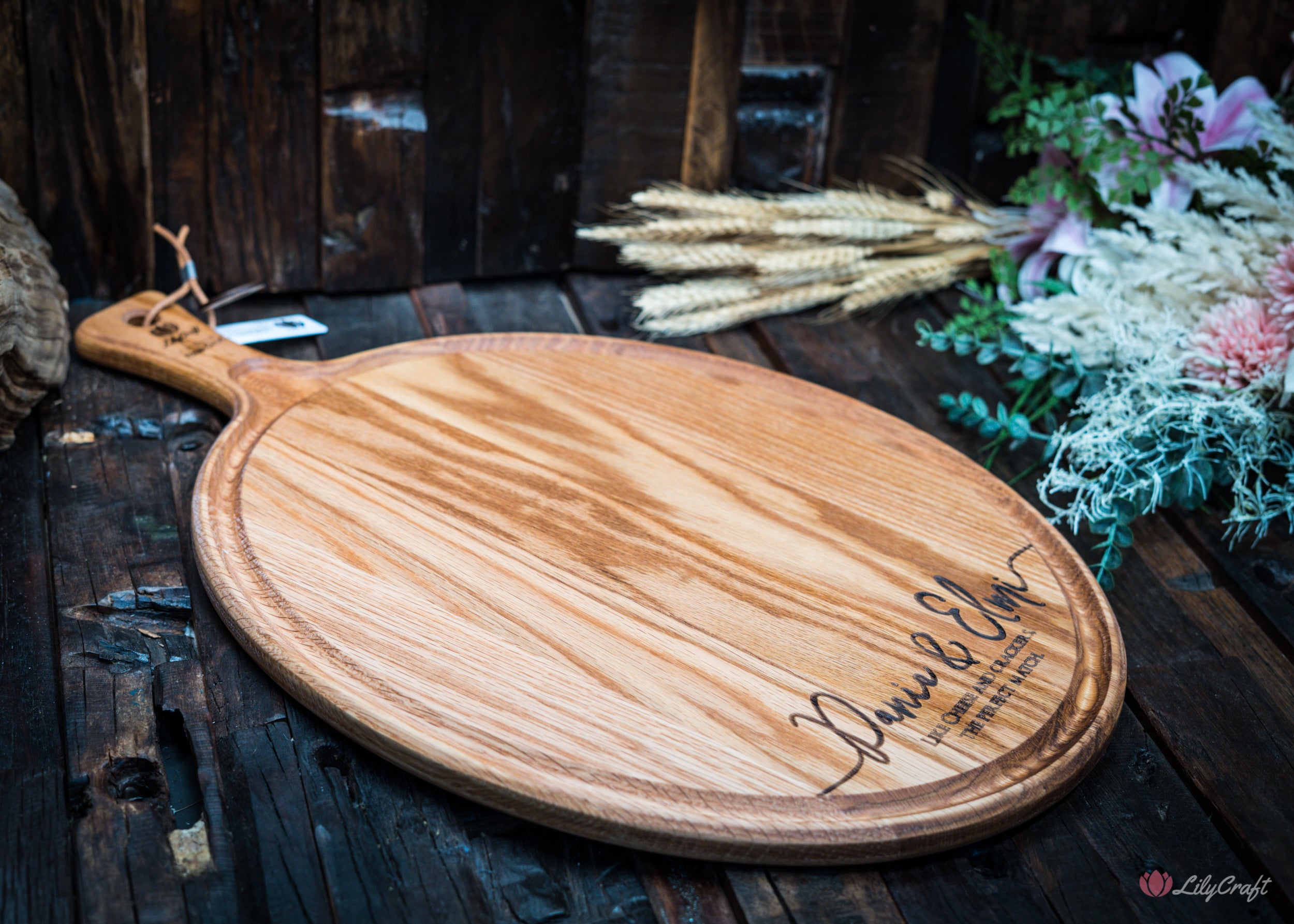 Elevate your dining experience with our elegant red oak cheese platter, designed for hosting memorable gatherings.
